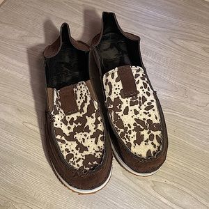 Brown and white cow print slip ons. Not worn one time. Size 10